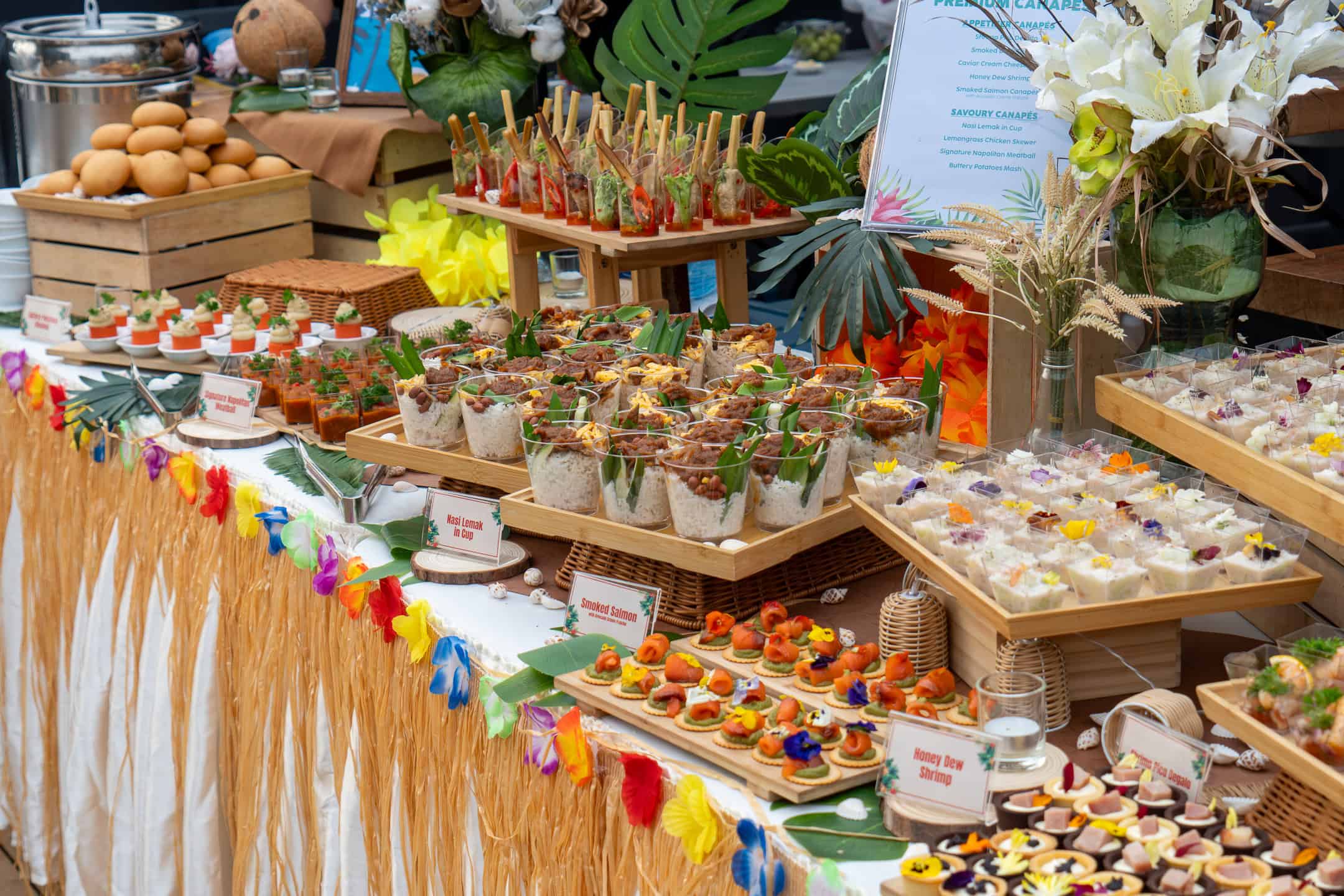 Canape catering by iDoCatering featuring a variety of gourmet canapés on elegant serving trays