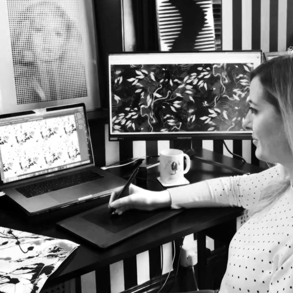 Lindsay drawing at her studio