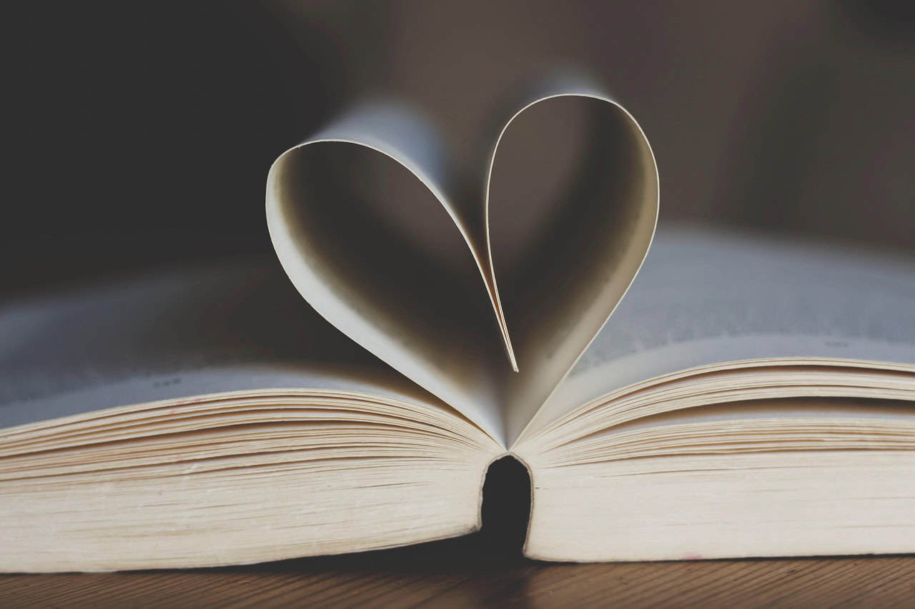 A heart made out of two pages of a book