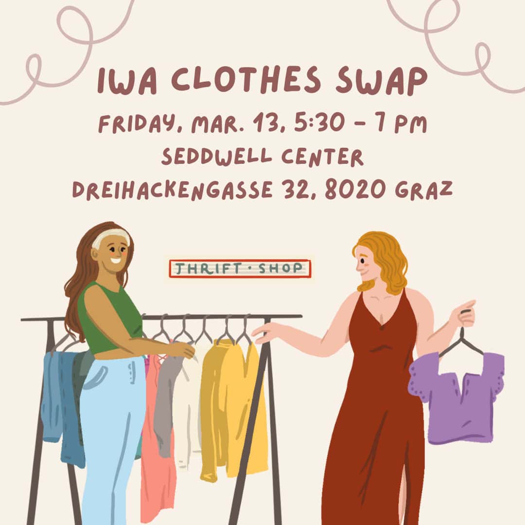 Two women look at clothes on a rack