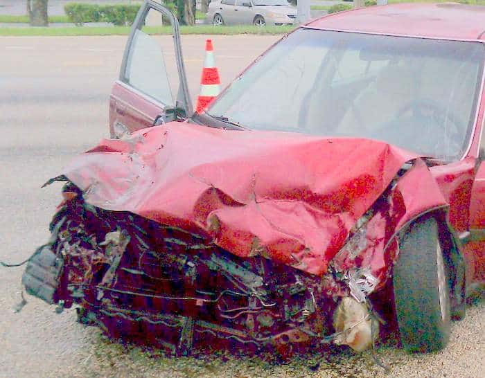 Front damage to car. Total loss.