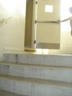 Large step down between the hallway and the landing area.