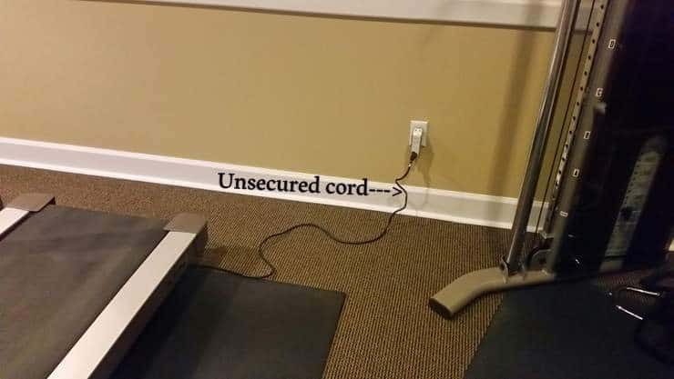 Unsecured Power cord in the gym at a Pinecrest, Miami Florida condominium building gym.