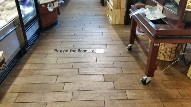 Slip and fall on a bag on the floor at a Miami, Florida supermarket.