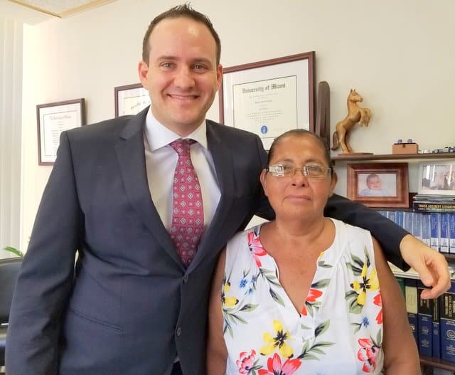 Attorney Justin Ziegler and our happy client