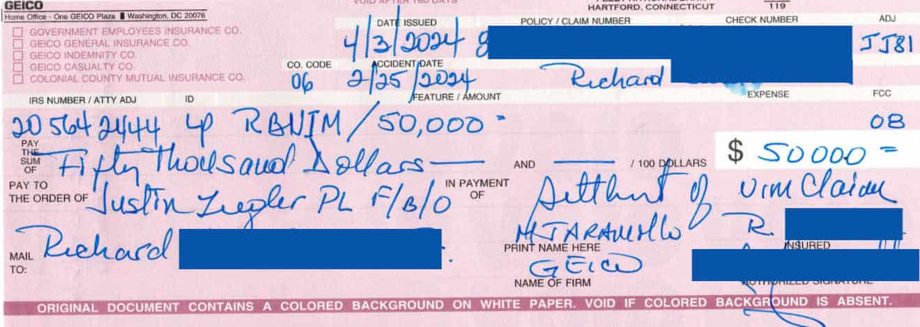Check from GEICO made payable to Justin Ziegler, P.L. for $50,000 in settlement of a UIM claim for a client injured in an accident.