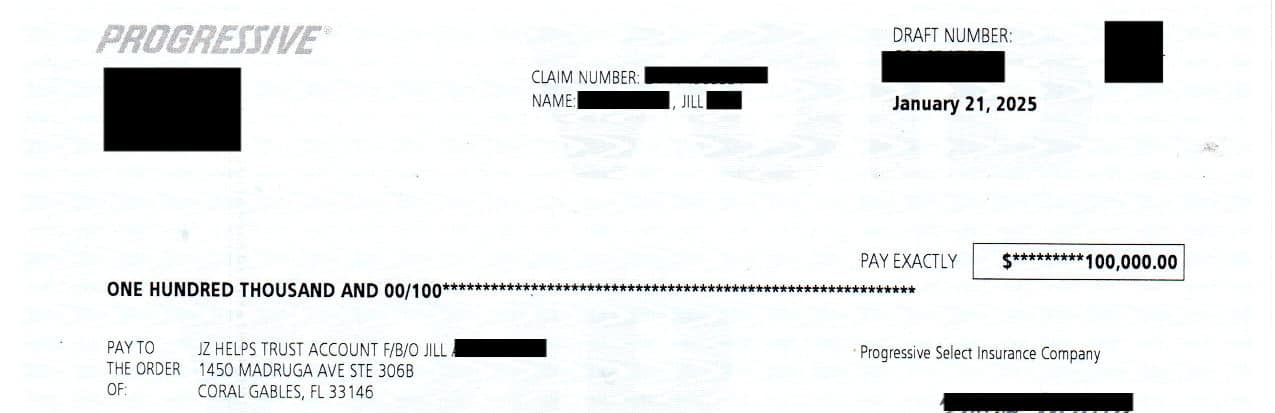 A redacted settlement check from Progressive Select Insurance Company dated January 21, 2025, made payable to "JZ Helps Trust Account F/B/O Jill [Last Name Redacted]" in the amount of $100,000.00. The check includes blacked-out sections covering the claim number, draft number, and parts of the claimant's name and address. The check is addressed to a Coral Gables, FL address. 