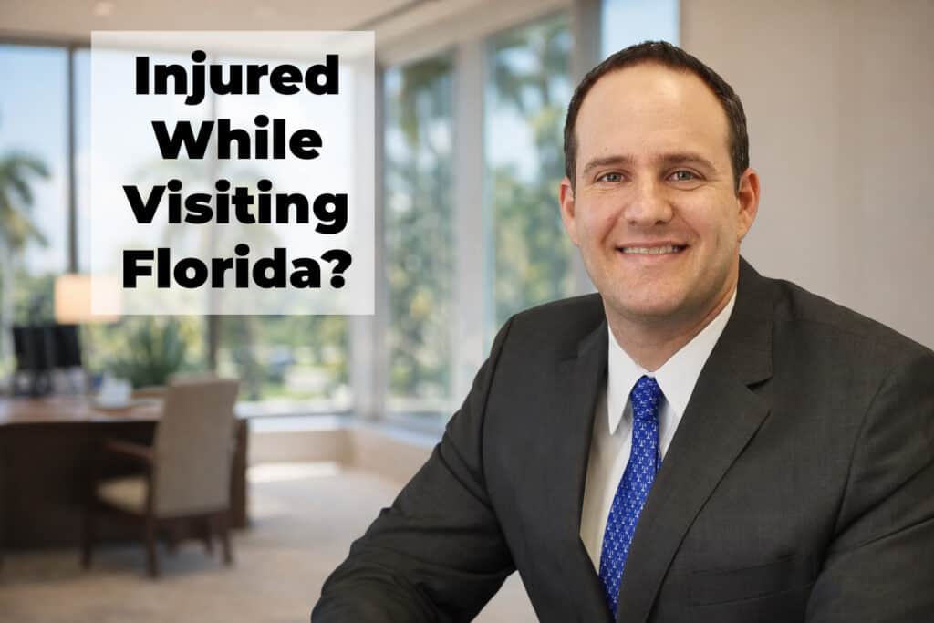 Florida personal injury attorney Justin Ziegler in office setting with text overlay "Injured While Visiting Florida?"