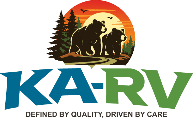 Image showing a bear and cub silhouette at sunset with trees in the background.