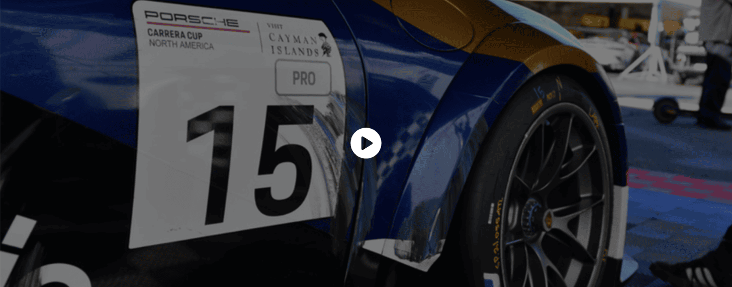 Kellymoss Porsche Carrera Cup race car with number 15 at the track.