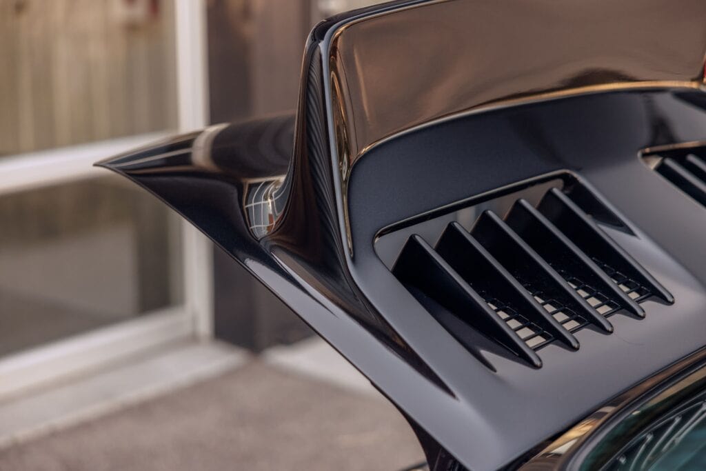Close-up of the rear wing and air vents of a 1989 Porsche 964.