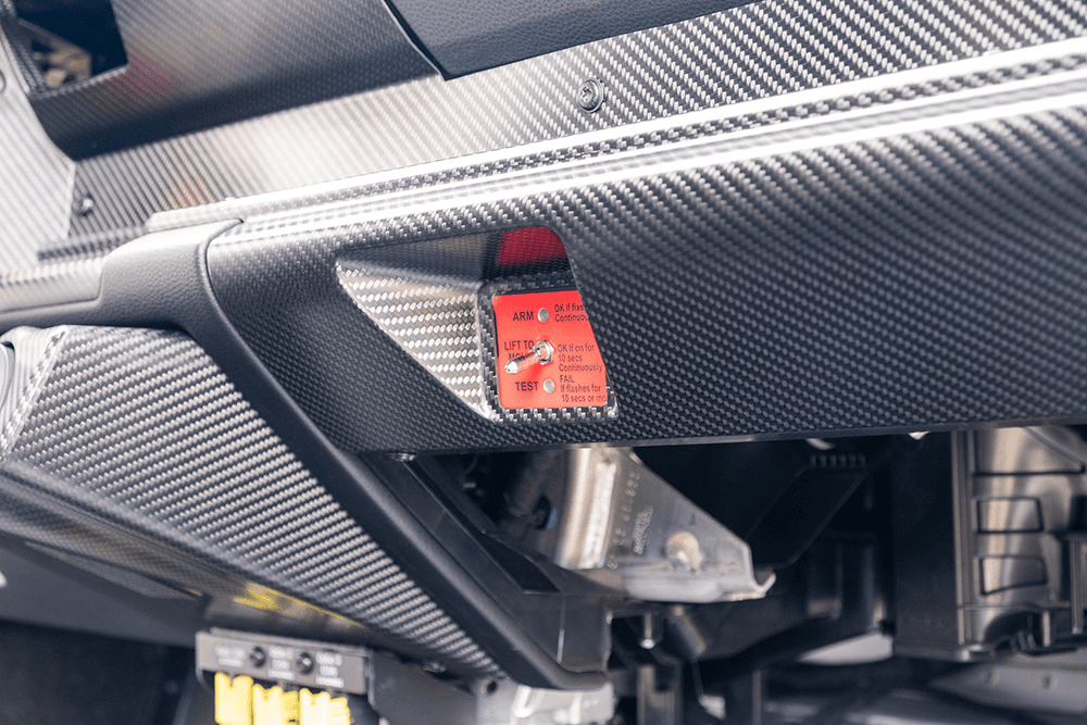 Close-up of a carbon fiber component on a 2021 Porsche 911 GT3 Cup 992.