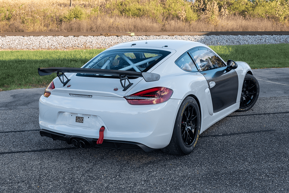 2016 Porsche 981 Clubsport MR with racing modifications and rear wing.