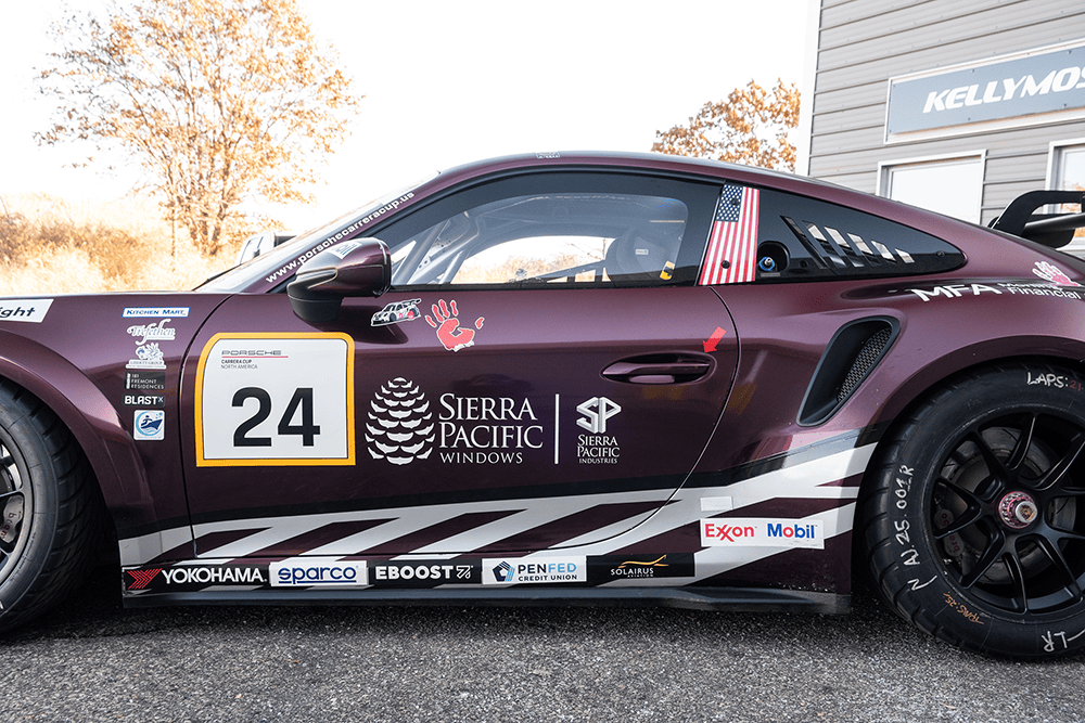 Kellymoss Porsche 911 GT3 Cup race car with sponsor decals and number 24.