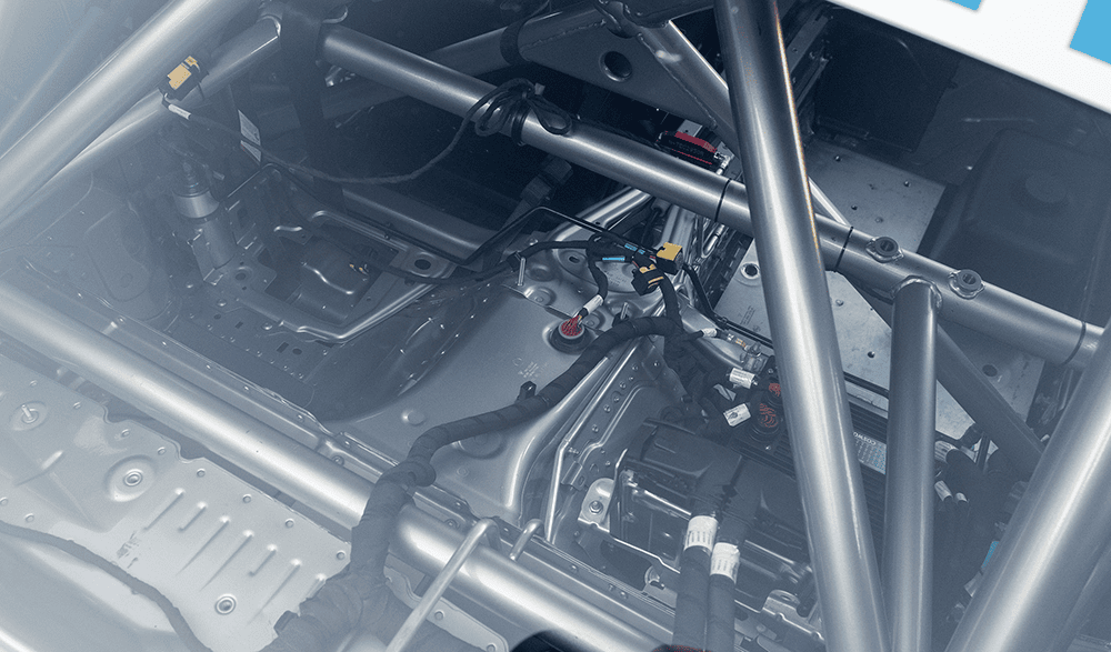 Close-up of the racing car's interior and roll cage structure.
