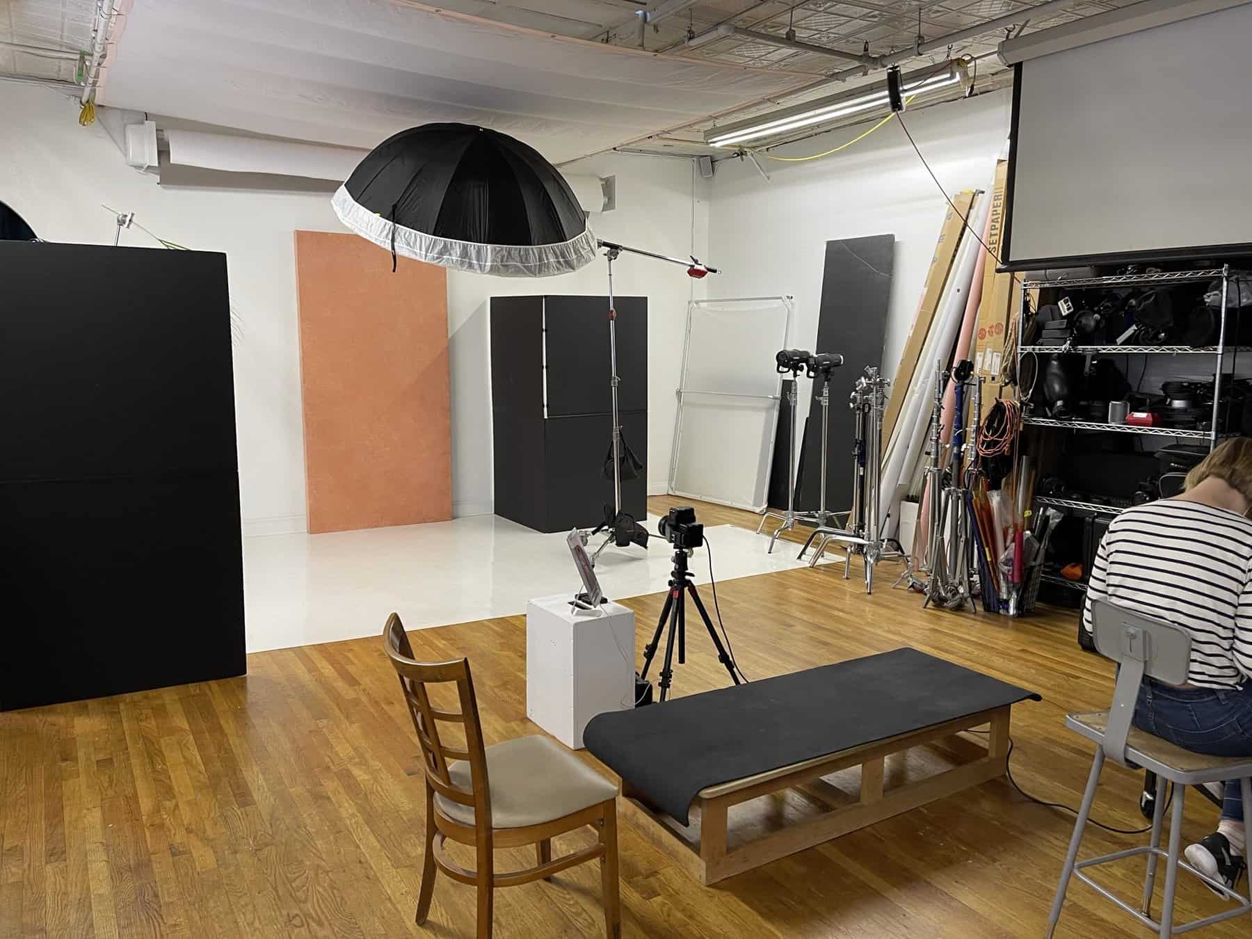 Editorial photography studio setup with lighting, grip, and backdrop options