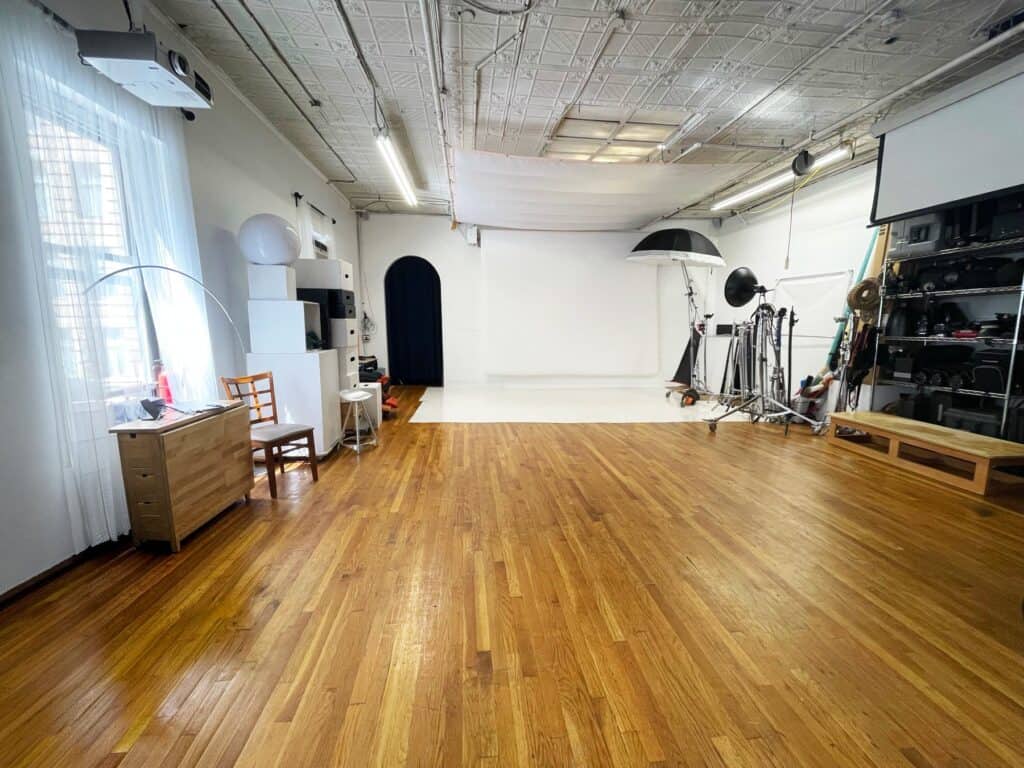 Open Manhattan photo studio rental space with hardwood floors and large shooting area