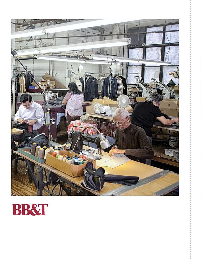 Campaign spread showing garment workers in a workshop and two people embracing outdoors.