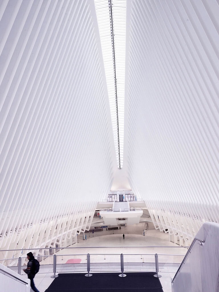 Empty World Trade Center Oculus interior with white ribbed architecture during COVID in New York City.