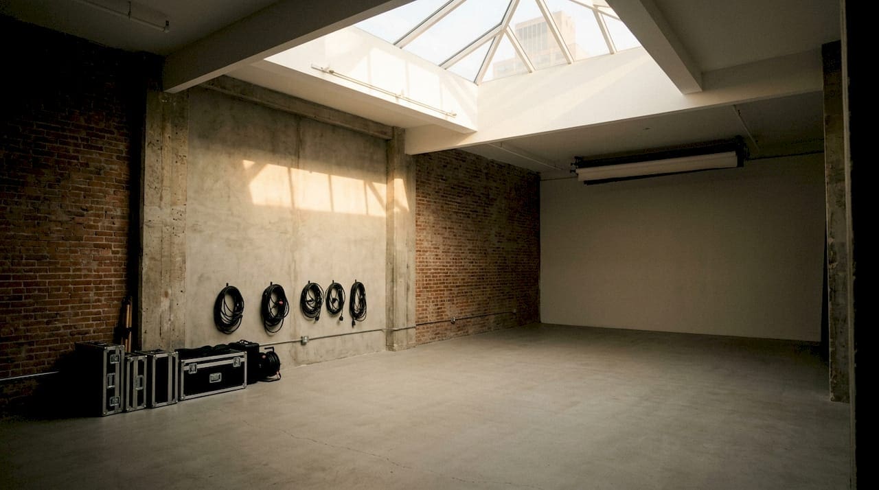 Empty raw black-box studio warehouse NYC