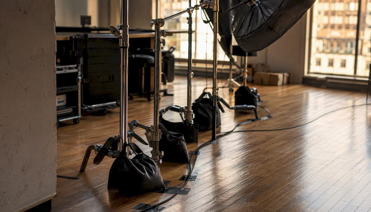C-stands with sandbags and gobo arms