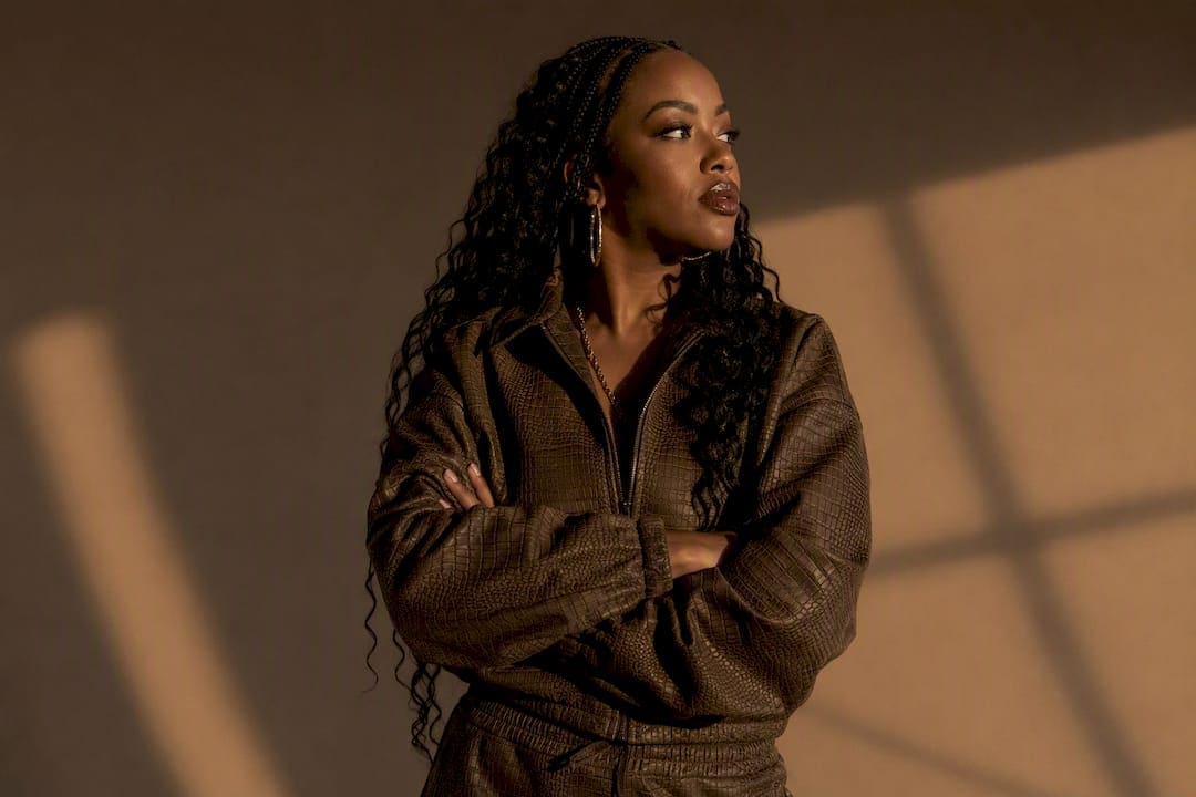 High-contrast lighting on silhouette and fabric texture