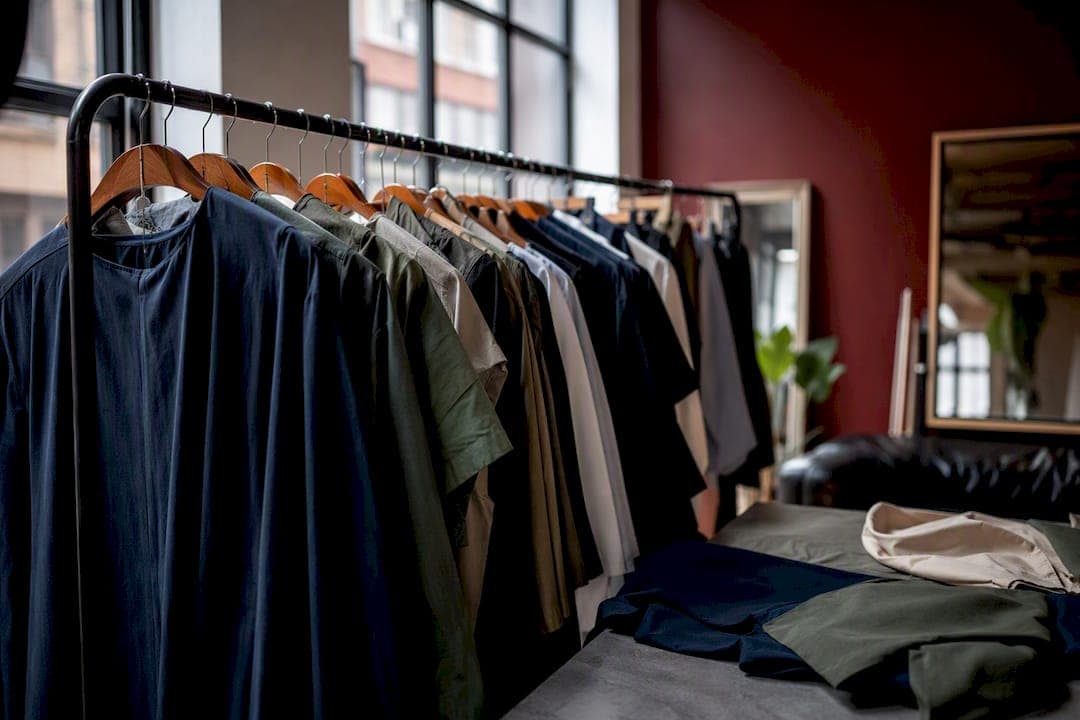 Studio rack with mid-tone interview wardrobe fabrics