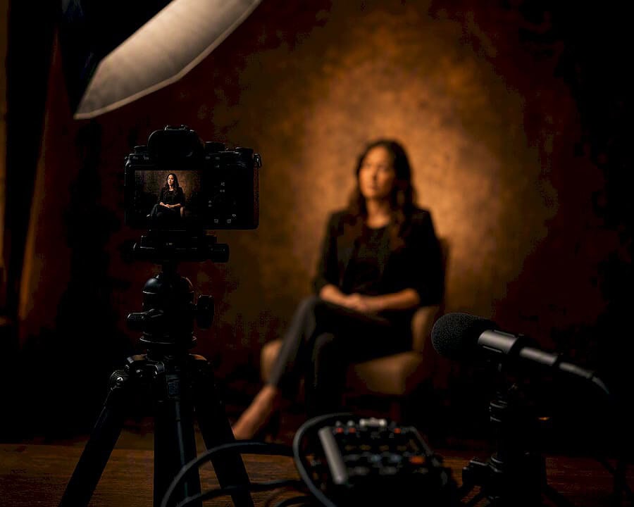 Talking head camera and lighting setup in studio