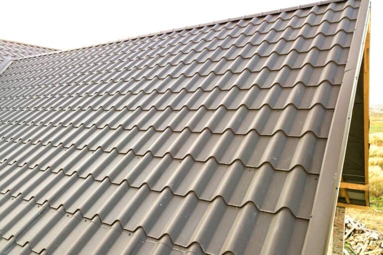 Durable metal roofing panels installed on a residential building by Kesting Construction.