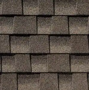 Close-up of GAF asphalt roofing shingles on a residential roof.