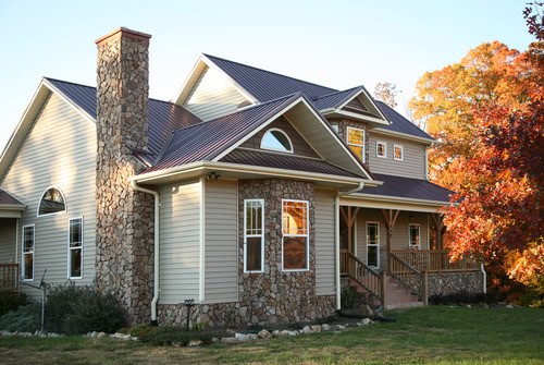 Elegant house exterior with durable siding and roofing, perfect for fall maintenance.