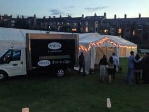 Our Branded fish and chip van outside a summer wedding marquee