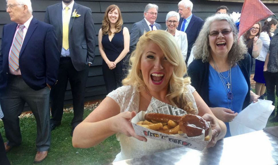 A bride holding her fish and chips