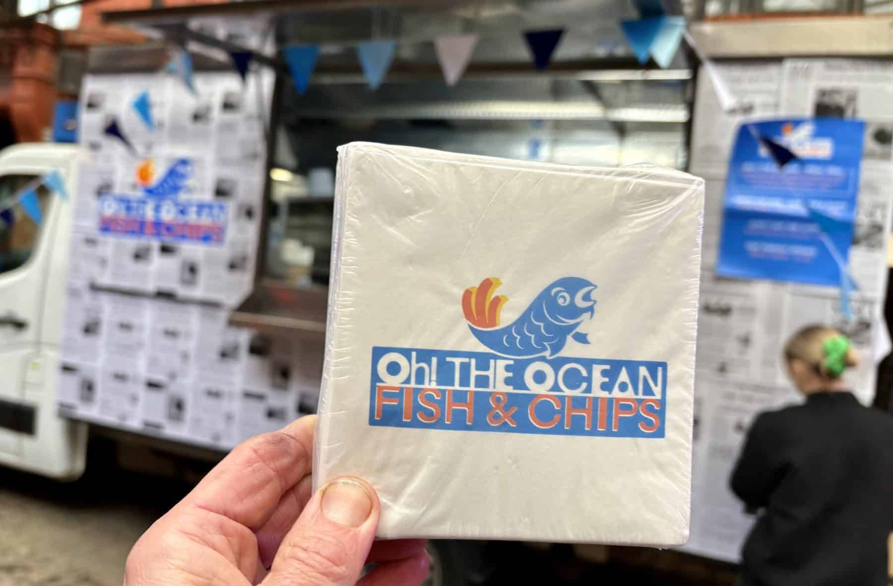 Fresh fish and chips menu wrap at Oh The Ocean Fish & Chips, local takeaway shop in the UK.