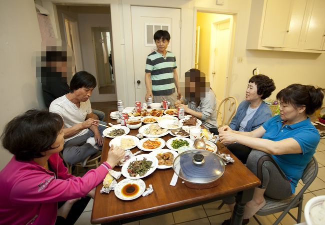 L.A-based North Korean defectors are smiling at the Chuseok gathering from last week. Sang Jin Kim