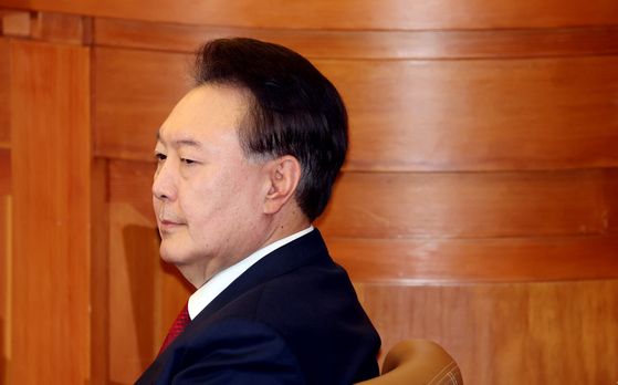 President Yoon Suk Yeol attends the 10th hearing of his impeachment trial at the Constitutional Court in Jongno District, central Seoul, on Feb. 20. [JOINT PRESS CORPS]