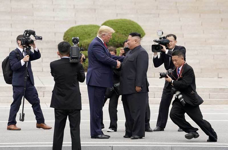U.S. President Donald Trump meets with North Korean leader Kim Jong-un at the demilitarized zone separating the two Koreas, in Panmunjom, South Korea, June 30, 2019. [REUTERS]
