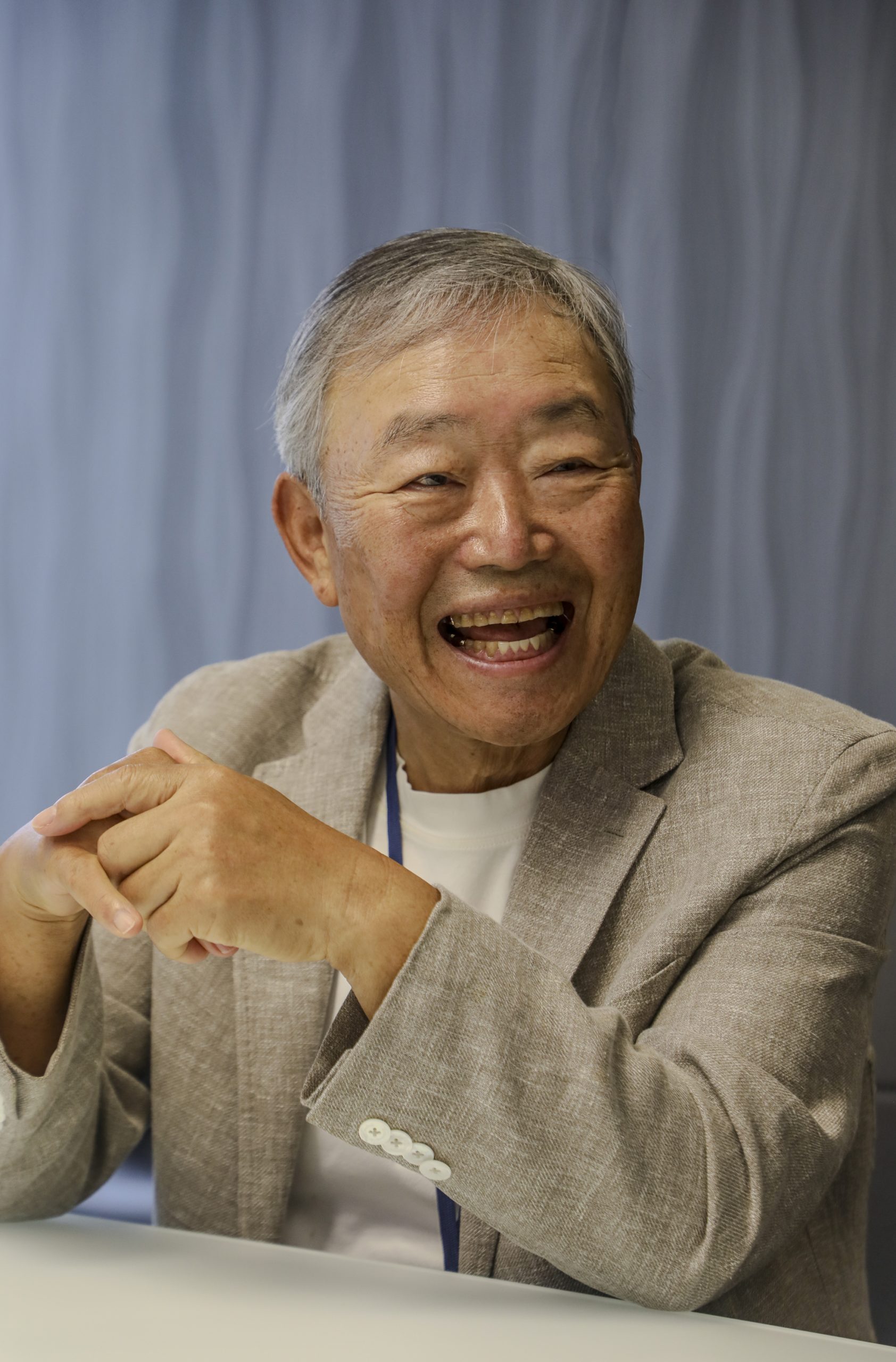 Brian Choi smiling during interview as Open Bank Chairman