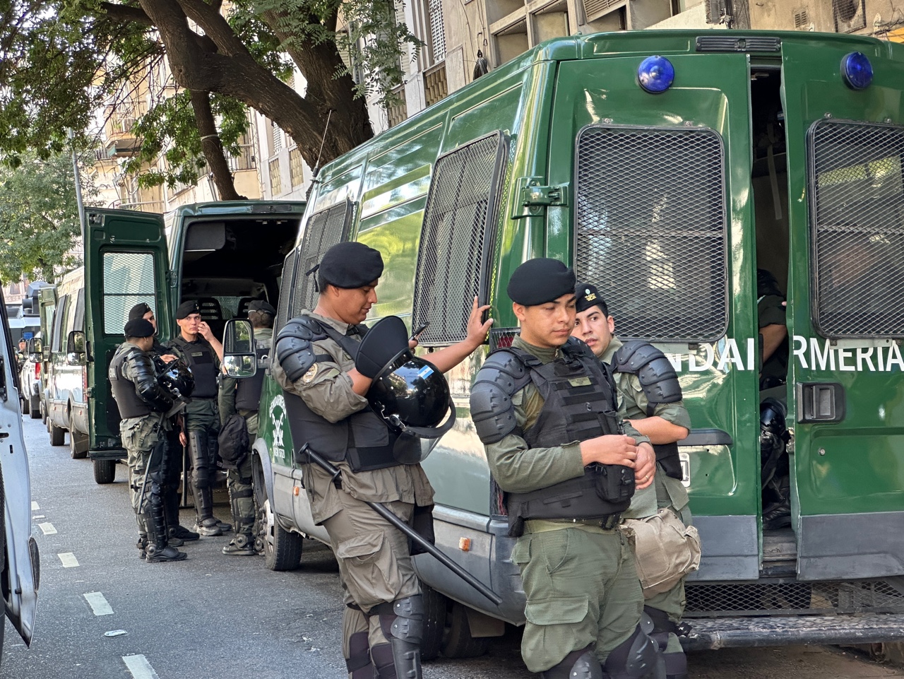 Argentine National Gendarmerie officers in riot gear prepare for protests in Buenos Aires.