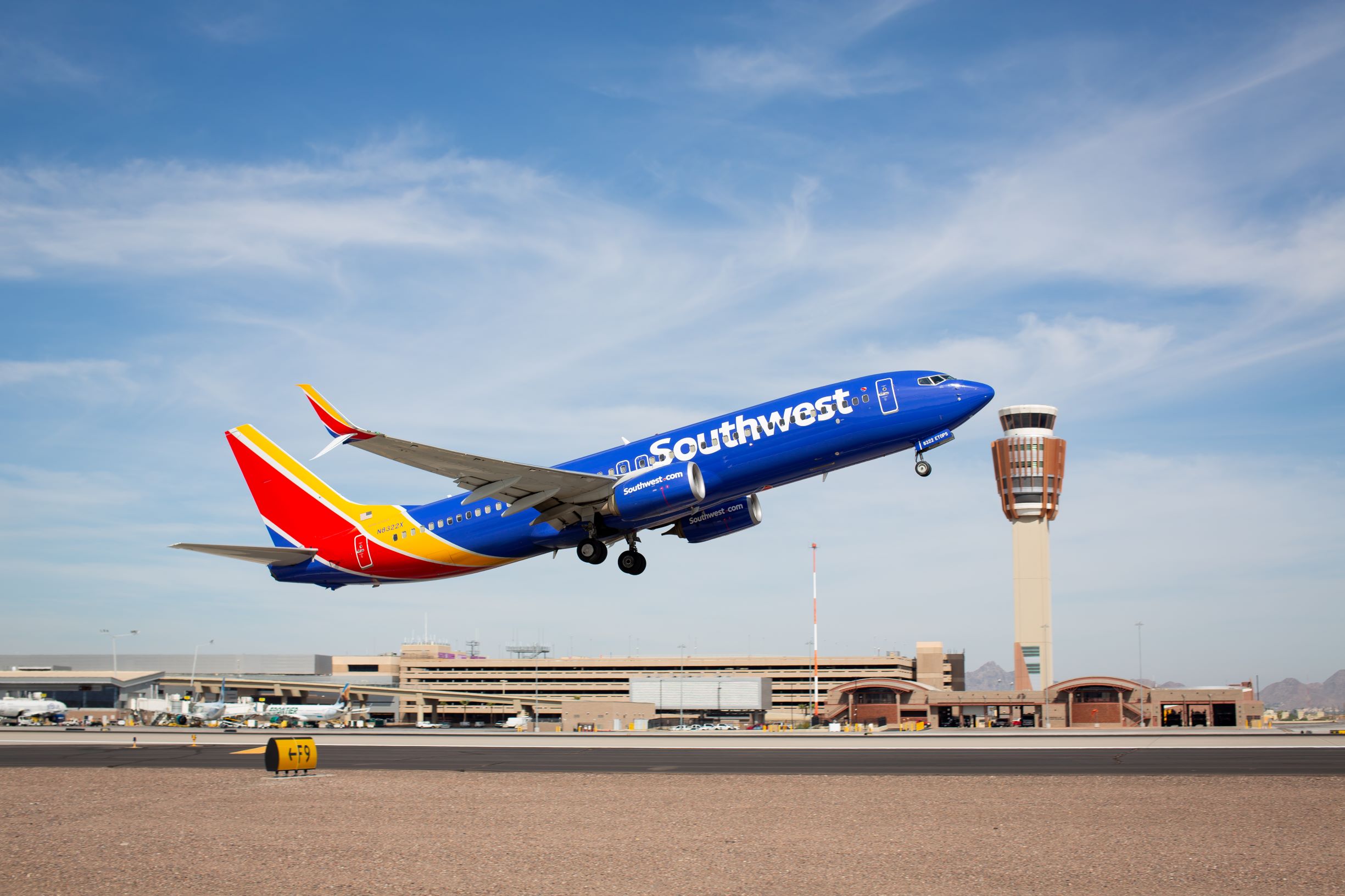 Southwest Airlines jet takes off as new baggage fees take effect.