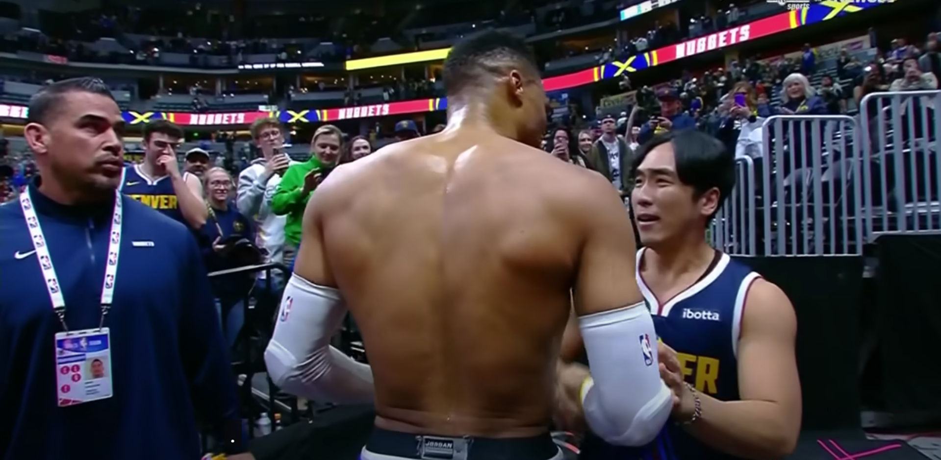 Russell Westbrook gifts his game-worn jersey to a superfan from South Korea after the Nuggets' win.