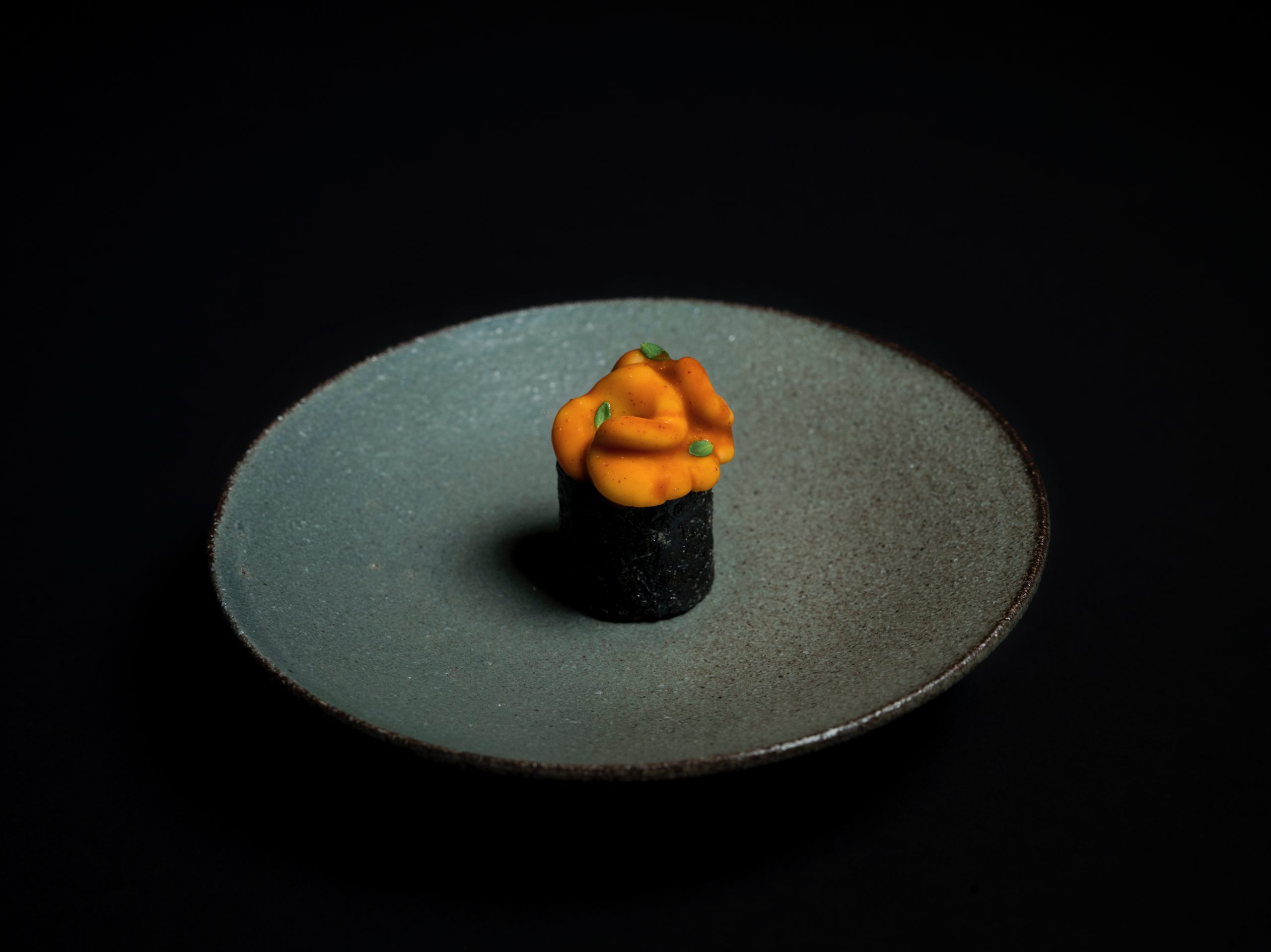 Signature kimbap with seaweed crisps, cod milt, and gochujang at Restaurant Ki