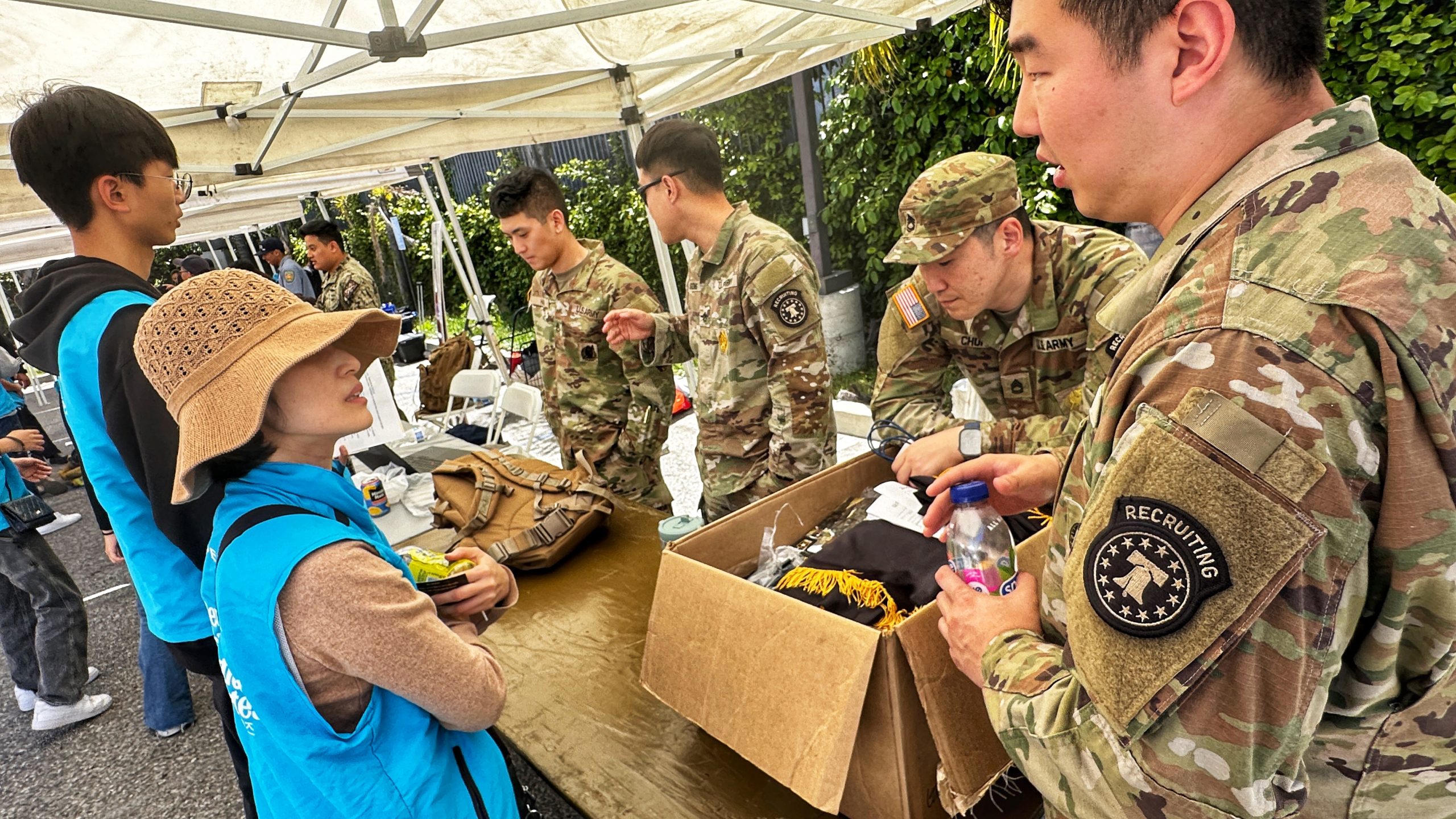 Sergeant Lee Hyeong-Min introduces the U.S. Army to attendees at a recruitment event in Los Angeles Koreatown last April.
