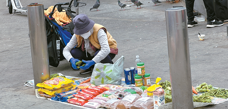 Korean American senior resells food bank items on Koreatown street corner