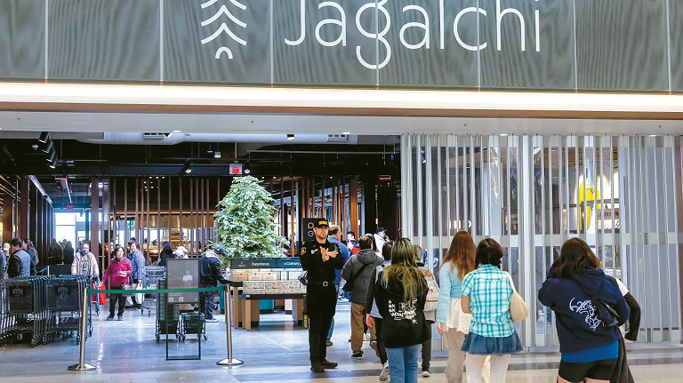 Customers wait to enter Korean food culture market Jagalchi in Daly City