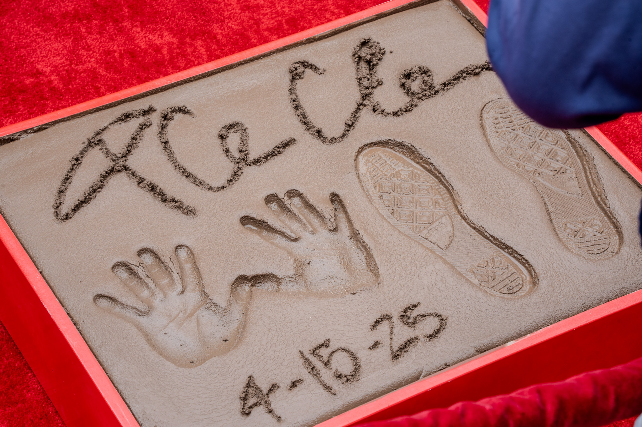 Ice Cube presses hands into cement at TCL Chinese Theatre