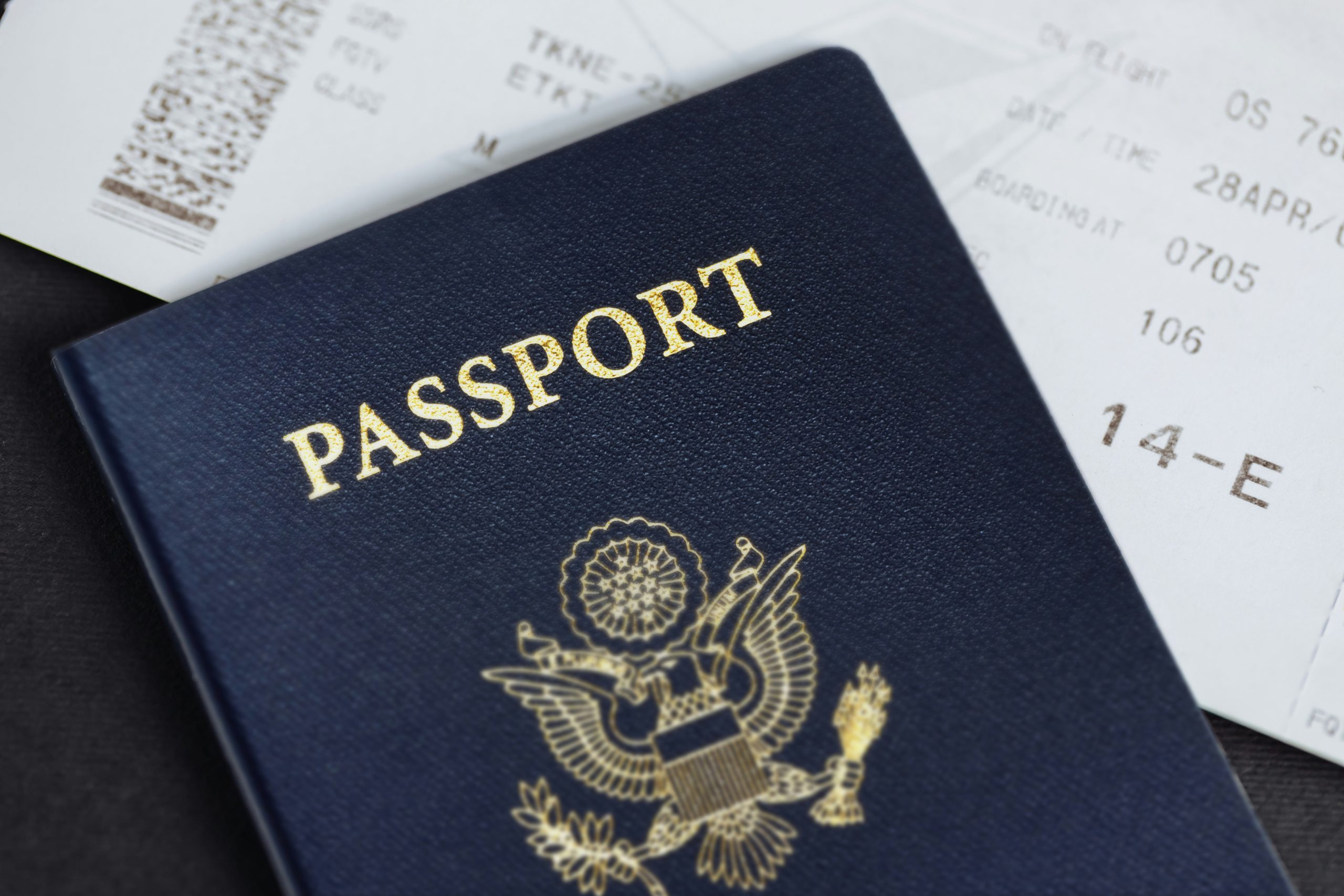 Korean American adoptee citizenship issue shown with a U.S. passport and flight ticket