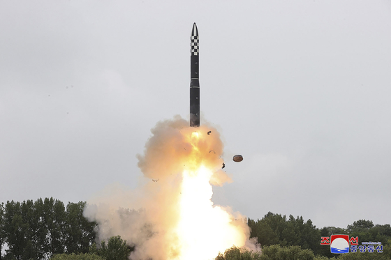North Korean test-fires a Hwasong-18 intercontinental ballistic missile (ICBM) on July 12 in a photo carried by the state-run Korean Central News Agency. Pyongyang launched another ICBM in 2023. [YONHAP]