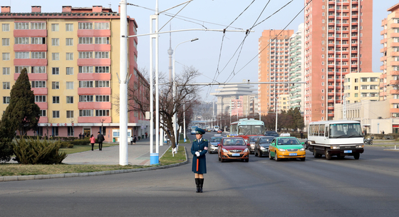 A traffic official stands in Pyongyang on April 4, 2017. [JOINT PRESS CORPS]