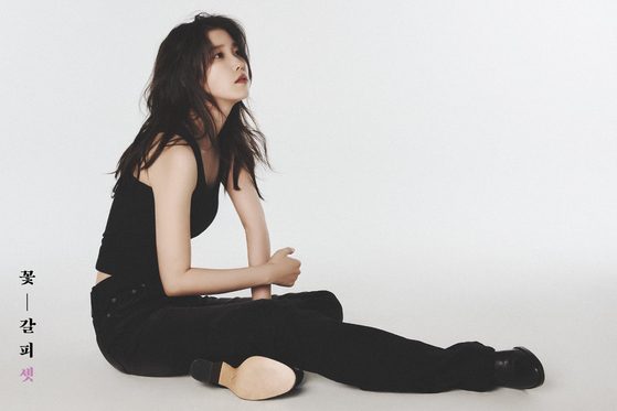 A promotional image for “A Flower Bookmark, Pt. 3,″ singer IU's third remake album [EDAM ENTERTAINMENT]
